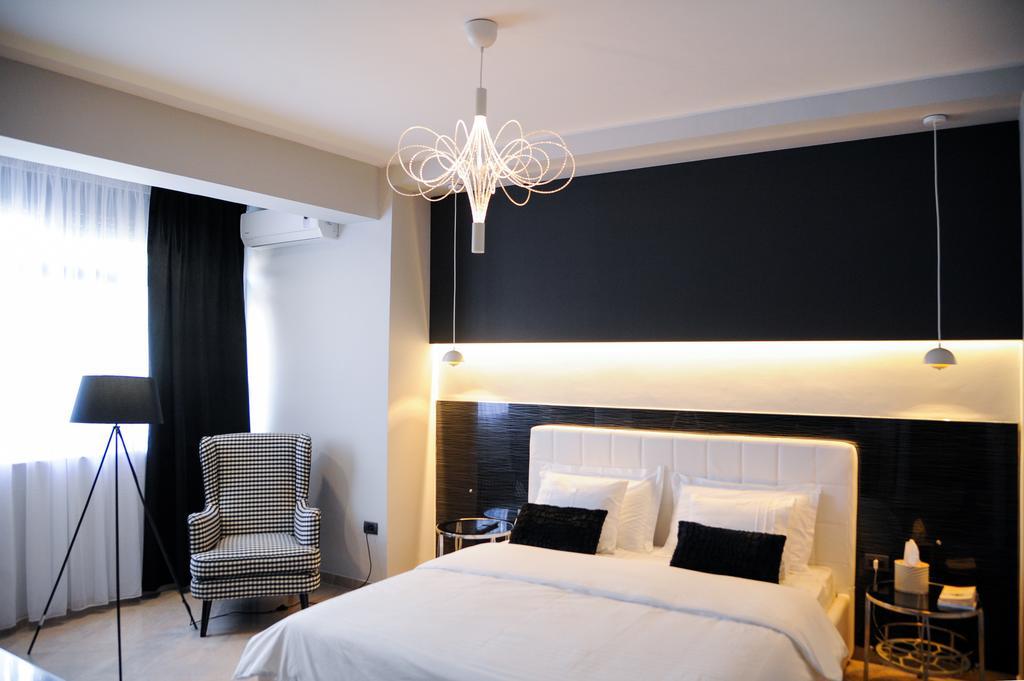 Tiranatop Suites Værelse billede